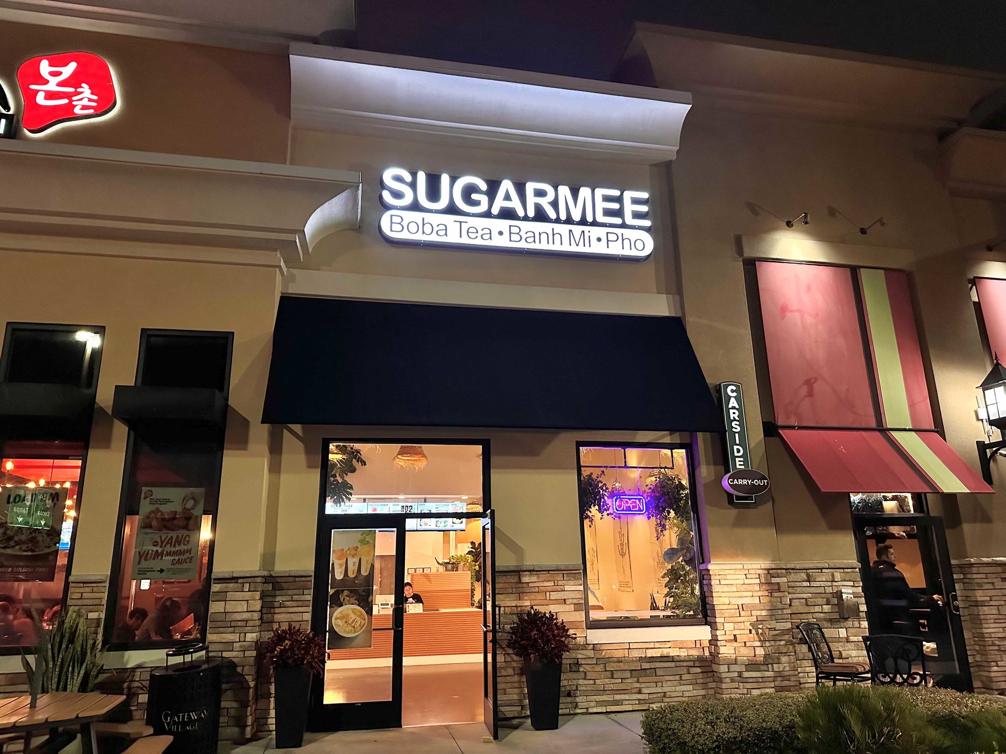 front of sugarmee building at night